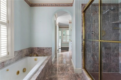 This stunning Mediterranean-style estate exudes timeless on Bobby Jones Golf Club in Georgia - for sale on GolfHomes.com, golf home, golf lot