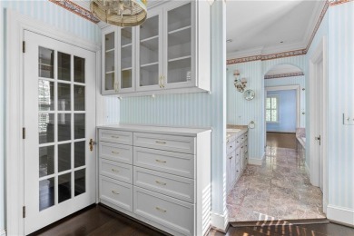This stunning Mediterranean-style estate exudes timeless on Bobby Jones Golf Club in Georgia - for sale on GolfHomes.com, golf home, golf lot