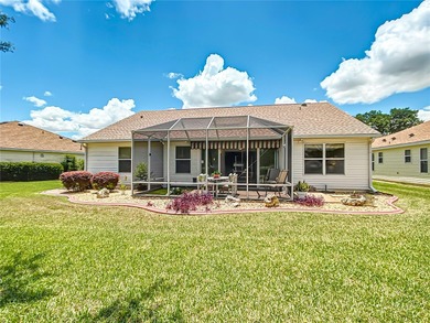 Located in the lovely Village of Briar Meadow, this GOLF COURSE on The Links of Spruce Creek in Florida - for sale on GolfHomes.com, golf home, golf lot