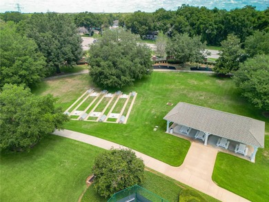 Located in the lovely Village of Briar Meadow, this GOLF COURSE on The Links of Spruce Creek in Florida - for sale on GolfHomes.com, golf home, golf lot