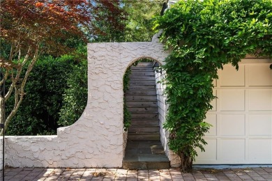This stunning Mediterranean-style estate exudes timeless on Bobby Jones Golf Club in Georgia - for sale on GolfHomes.com, golf home, golf lot