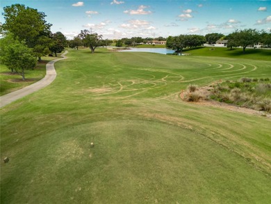 Located in the lovely Village of Briar Meadow, this GOLF COURSE on The Links of Spruce Creek in Florida - for sale on GolfHomes.com, golf home, golf lot