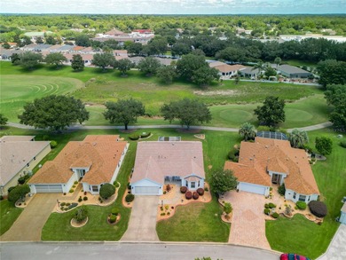 Located in the lovely Village of Briar Meadow, this GOLF COURSE on The Links of Spruce Creek in Florida - for sale on GolfHomes.com, golf home, golf lot