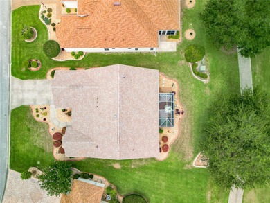 Located in the lovely Village of Briar Meadow, this GOLF COURSE on The Links of Spruce Creek in Florida - for sale on GolfHomes.com, golf home, golf lot