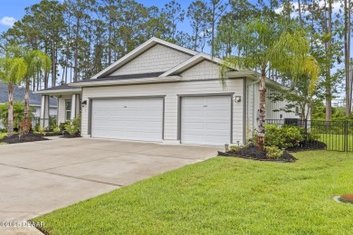 Discover this beautifully maintained 3-bedroom, 2-bathroom home on The Grand Club Cypress Course in Florida - for sale on GolfHomes.com, golf home, golf lot