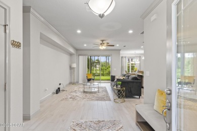 Discover this beautifully maintained 3-bedroom, 2-bathroom home on The Grand Club Cypress Course in Florida - for sale on GolfHomes.com, golf home, golf lot