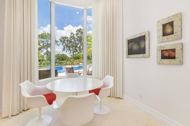 An extraordinary one level offering within the prestigious Palm on  in Florida - for sale on GolfHomes.com, golf home, golf lot