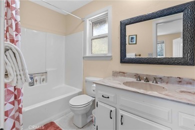Discover this beautifully remodeled 3-bedroom, 3-bathroom on Lake Arrowhead Country Club in California - for sale on GolfHomes.com, golf home, golf lot