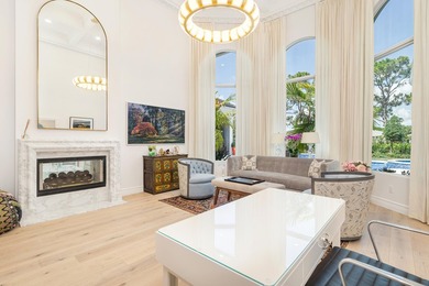 An extraordinary one level offering within the prestigious Palm on  in Florida - for sale on GolfHomes.com, golf home, golf lot