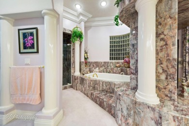 Step into timeless elegance with this stunning former Parade on Sunbrook Golf Course in Utah - for sale on GolfHomes.com, golf home, golf lot
