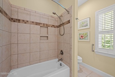 Located in a park-style neighbourhood, this cul-de-sac home has on Carolina Colours Golf Club in North Carolina - for sale on GolfHomes.com, golf home, golf lot