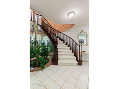 Step into timeless elegance with this stunning former Parade on Sunbrook Golf Course in Utah - for sale on GolfHomes.com, golf home, golf lot