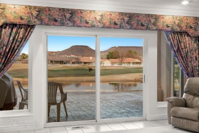 Step into timeless elegance with this stunning former Parade on Sunbrook Golf Course in Utah - for sale on GolfHomes.com, golf home, golf lot