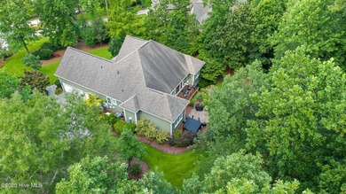 Located in a park-style neighbourhood, this cul-de-sac home has on Carolina Colours Golf Club in North Carolina - for sale on GolfHomes.com, golf home, golf lot