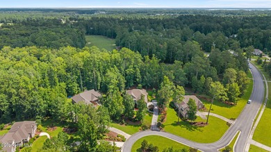 Located in a park-style neighbourhood, this cul-de-sac home has on Carolina Colours Golf Club in North Carolina - for sale on GolfHomes.com, golf home, golf lot
