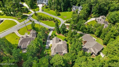 Located in a park-style neighbourhood, this cul-de-sac home has on Carolina Colours Golf Club in North Carolina - for sale on GolfHomes.com, golf home, golf lot