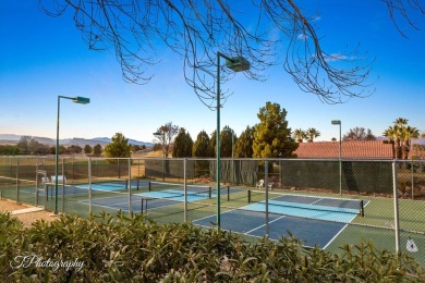 Step into timeless elegance with this stunning former Parade on Sunbrook Golf Course in Utah - for sale on GolfHomes.com, golf home, golf lot