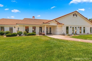 Step into timeless elegance with this stunning former Parade on Sunbrook Golf Course in Utah - for sale on GolfHomes.com, golf home, golf lot