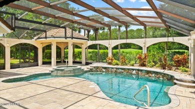 Welcome to this exquisite custom-built home located in the on Plantation Bay Golf and Country Club in Florida - for sale on GolfHomes.com, golf home, golf lot
