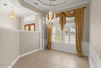 Welcome to this exquisite custom-built home located in the on Plantation Bay Golf and Country Club in Florida - for sale on GolfHomes.com, golf home, golf lot