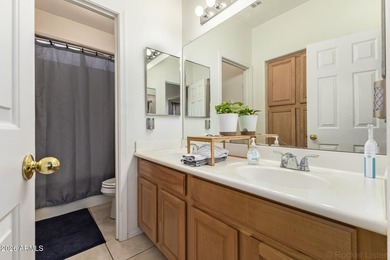 This beautifully maintained 5-bedroom, 3-bath home features a on Augusta Ranch Golf Club in Arizona - for sale on GolfHomes.com, golf home, golf lot