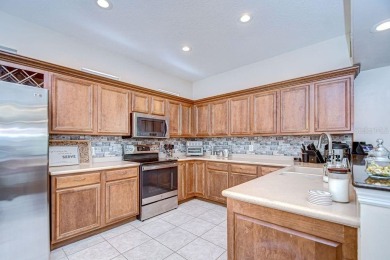 This BEAUTIFULLY MAINTAINED 3 bedroom courtyard home is move-in on The Groves Golf and Country Club in Florida - for sale on GolfHomes.com, golf home, golf lot