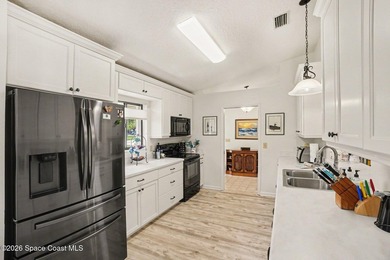 Expanded Raleigh model in a resort-style country club community on Indian River Colony Club in Florida - for sale on GolfHomes.com, golf home, golf lot