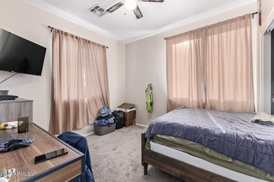 This beautifully maintained 5-bedroom, 3-bath home features a on Augusta Ranch Golf Club in Arizona - for sale on GolfHomes.com, golf home, golf lot