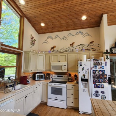 This beautifully designed home offers the perfect blend of on Lords Valley Country Club, Inc in Pennsylvania - for sale on GolfHomes.com, golf home, golf lot