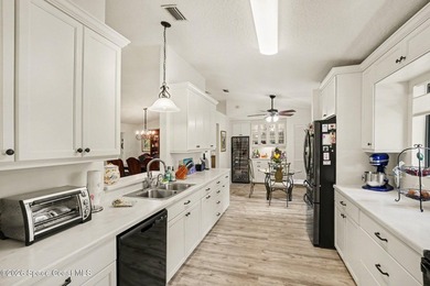 Expanded Raleigh model in a resort-style country club community on Indian River Colony Club in Florida - for sale on GolfHomes.com, golf home, golf lot