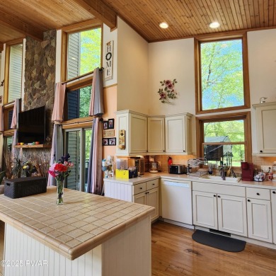 This beautifully designed home offers the perfect blend of on Lords Valley Country Club, Inc in Pennsylvania - for sale on GolfHomes.com, golf home, golf lot