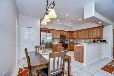This BEAUTIFULLY MAINTAINED 3 bedroom courtyard home is move-in on The Groves Golf and Country Club in Florida - for sale on GolfHomes.com, golf home, golf lot