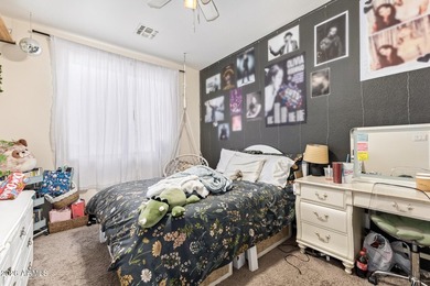 This beautifully maintained 5-bedroom, 3-bath home features a on Augusta Ranch Golf Club in Arizona - for sale on GolfHomes.com, golf home, golf lot