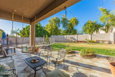 This beautifully maintained 5-bedroom, 3-bath home features a on Augusta Ranch Golf Club in Arizona - for sale on GolfHomes.com, golf home, golf lot