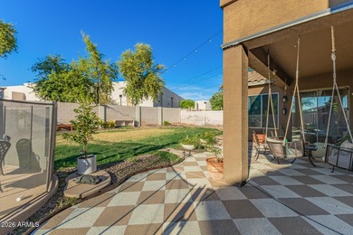 This beautifully maintained 5-bedroom, 3-bath home features a on Augusta Ranch Golf Club in Arizona - for sale on GolfHomes.com, golf home, golf lot