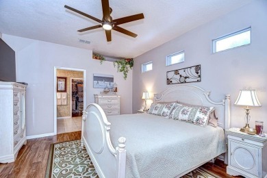 This BEAUTIFULLY MAINTAINED 3 bedroom courtyard home is move-in on The Groves Golf and Country Club in Florida - for sale on GolfHomes.com, golf home, golf lot