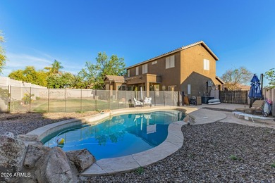 This beautifully maintained 5-bedroom, 3-bath home features a on Augusta Ranch Golf Club in Arizona - for sale on GolfHomes.com, golf home, golf lot