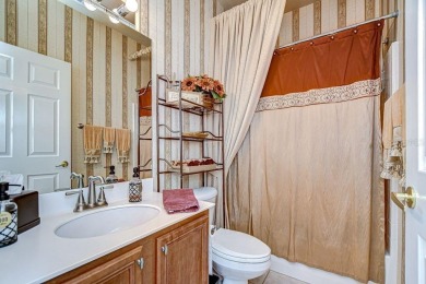 This BEAUTIFULLY MAINTAINED 3 bedroom courtyard home is move-in on The Groves Golf and Country Club in Florida - for sale on GolfHomes.com, golf home, golf lot