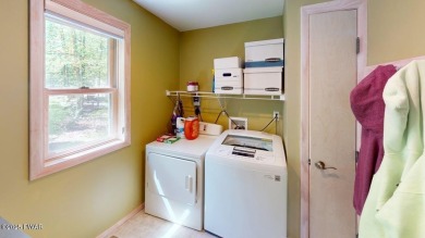 This beautifully designed home offers the perfect blend of on Lords Valley Country Club, Inc in Pennsylvania - for sale on GolfHomes.com, golf home, golf lot