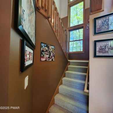 This beautifully designed home offers the perfect blend of on Lords Valley Country Club, Inc in Pennsylvania - for sale on GolfHomes.com, golf home, golf lot