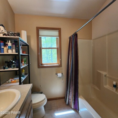 This beautifully designed home offers the perfect blend of on Lords Valley Country Club, Inc in Pennsylvania - for sale on GolfHomes.com, golf home, golf lot