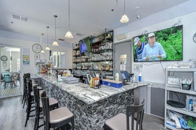 This BEAUTIFULLY MAINTAINED 3 bedroom courtyard home is move-in on The Groves Golf and Country Club in Florida - for sale on GolfHomes.com, golf home, golf lot
