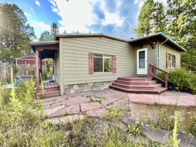 Charming mountain retreat located in the desirable Valle on El Valle Escondido Golf Course in New Mexico - for sale on GolfHomes.com, golf home, golf lot