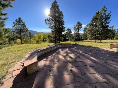 Charming mountain retreat located in the desirable Valle on El Valle Escondido Golf Course in New Mexico - for sale on GolfHomes.com, golf home, golf lot