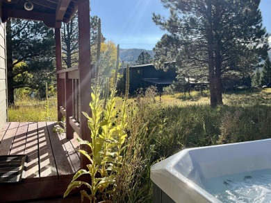 Charming mountain retreat located in the desirable Valle on El Valle Escondido Golf Course in New Mexico - for sale on GolfHomes.com, golf home, golf lot