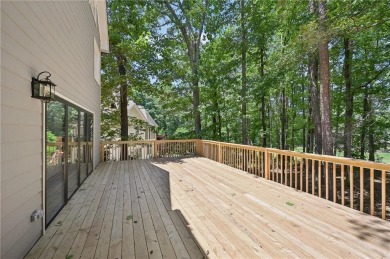 Welcome to this beautifully renovated 5-bedroom, 3.5-bathroom on Brookstone Golf and Country Club in Georgia - for sale on GolfHomes.com, golf home, golf lot