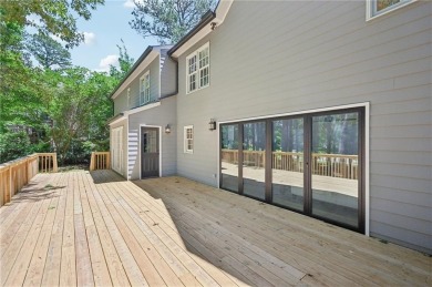 Welcome to this beautifully renovated 5-bedroom, 3.5-bathroom on Brookstone Golf and Country Club in Georgia - for sale on GolfHomes.com, golf home, golf lot