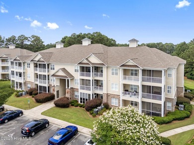Discover your slice of paradise in this stunning 3 bedroom, 2 on Crow Creek Golf Club in North Carolina - for sale on GolfHomes.com, golf home, golf lot