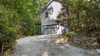 Tucked away on a quiet cul-de-sac in the desirable Holly Forest on Sapphire National Golf Club in North Carolina - for sale on GolfHomes.com, golf home, golf lot