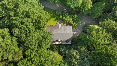 Tucked away on a quiet cul-de-sac in the desirable Holly Forest on Sapphire National Golf Club in North Carolina - for sale on GolfHomes.com, golf home, golf lot